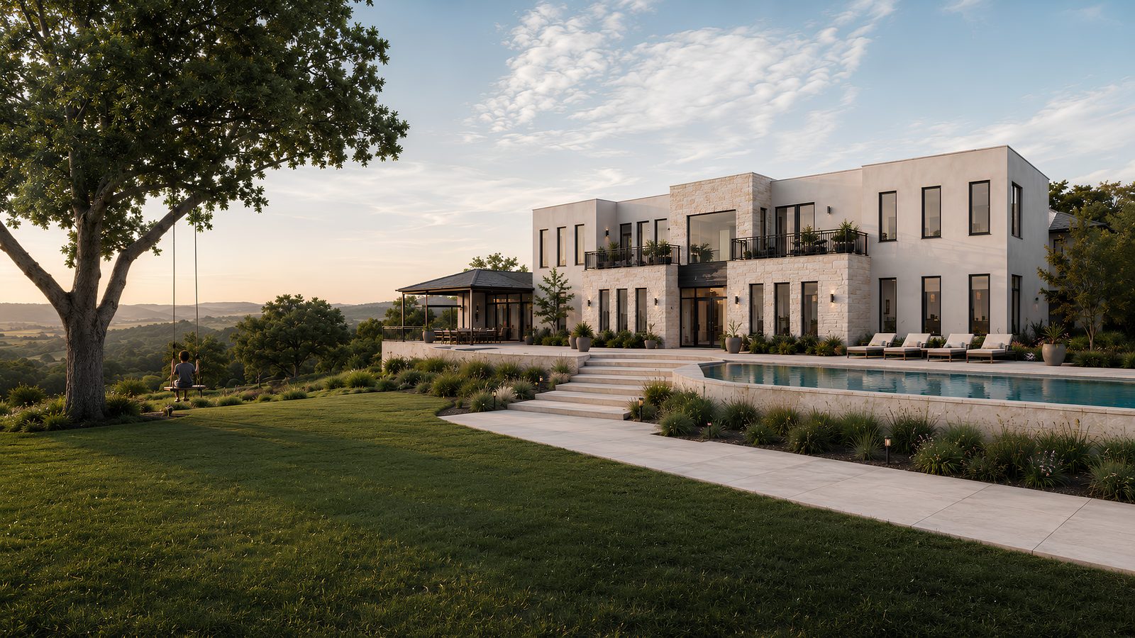 Modern stone-and-stucco Houston home at dusk